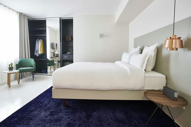 Modern hotel business room with workspace for conference guests and corporate travel.