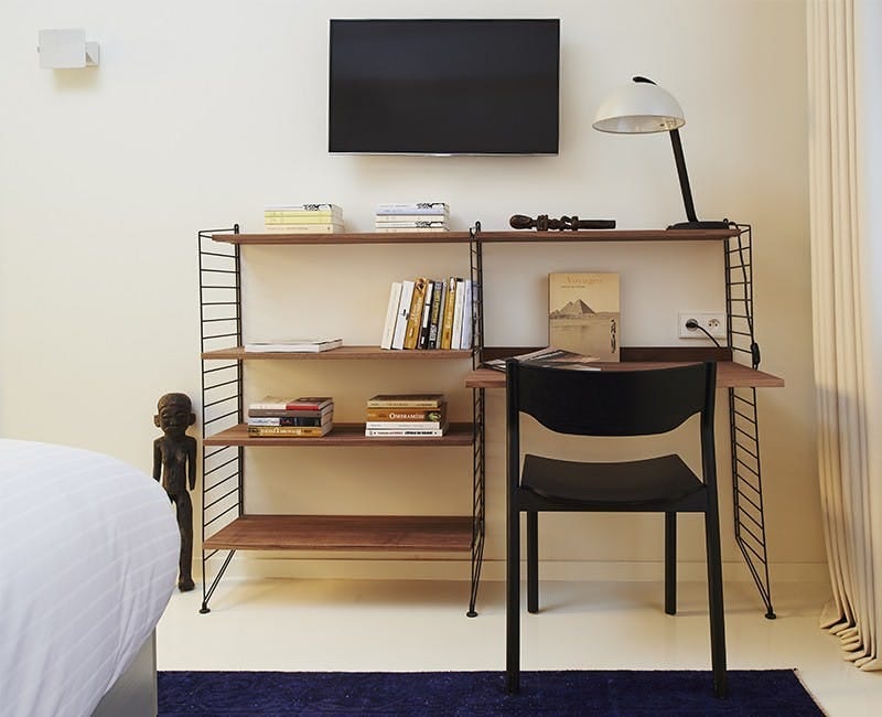Modern hotel business corner with ergonomic workstation for corporate travel and remote work.