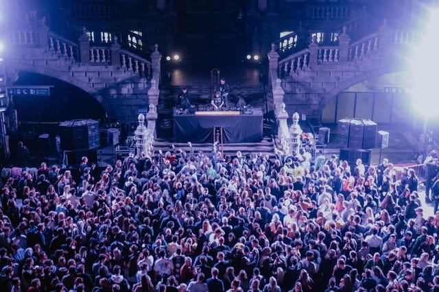 Grand staircase foyer at experiential event, ideal for corporate galas and venue brand activation.