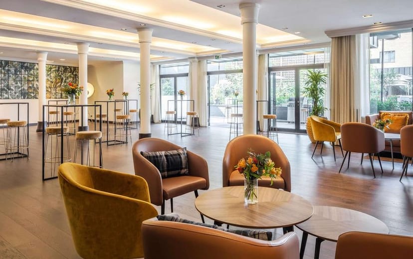 Lounge Olifant, Le Louise Hotel: Versatile event space for corporate networking and receptions.