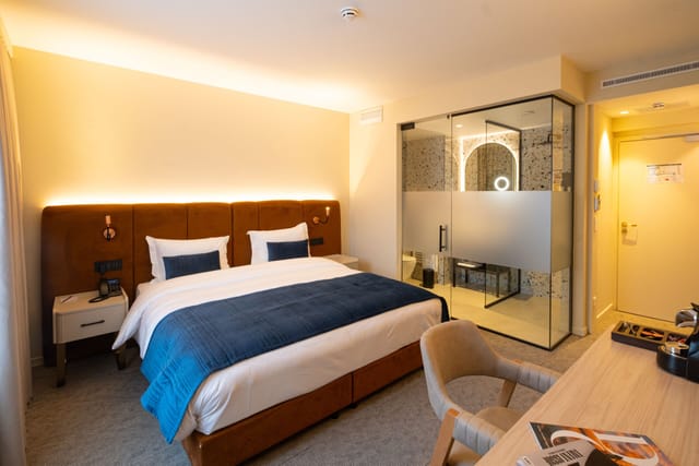 Modern Liman Hotel suite with workspace for business travel and corporate site inspections.