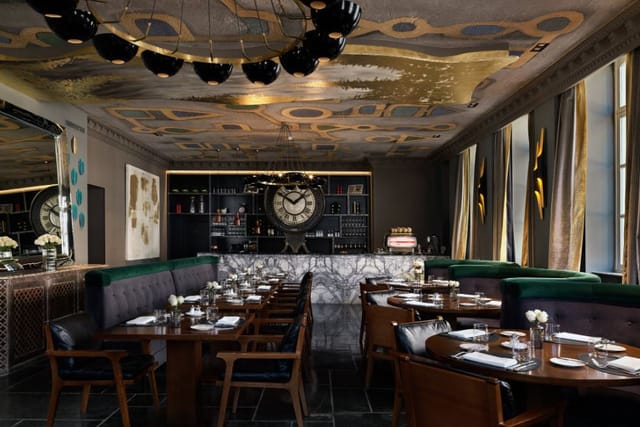Luxury restaurant with ceiling feature for corporate dinners and VIP networking events.