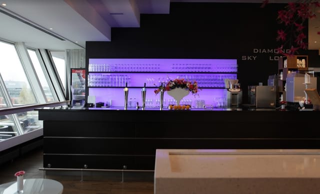 Diamond & Sky Lounge with purple lighting for networking events and corporate cocktail receptions.
