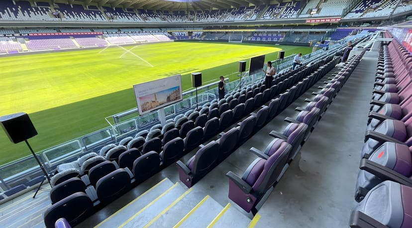 Lotto Park stadium terrace converted into a high-capacity conference space for corporate events.