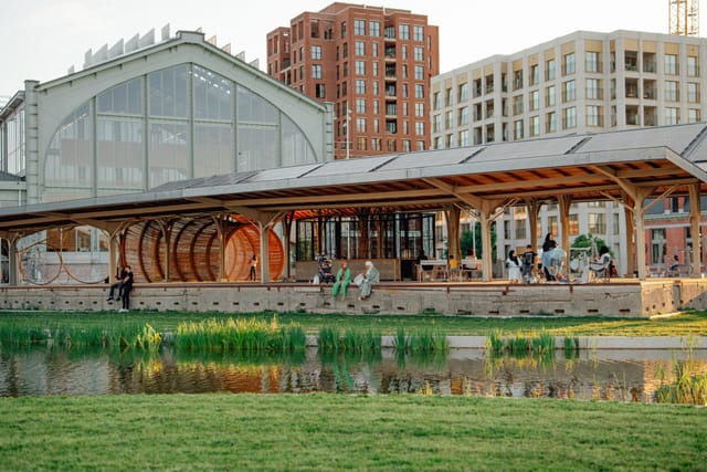 Industrial-style outdoor pavilion at Quai Aux Poissons, perfect for networking events and meetings.