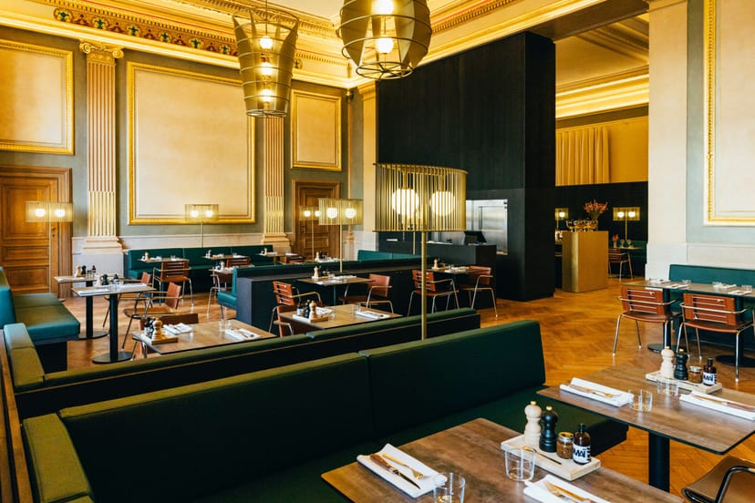 Sophisticated Café in Bourse venue with modular seating for corporate luncheons and networking.