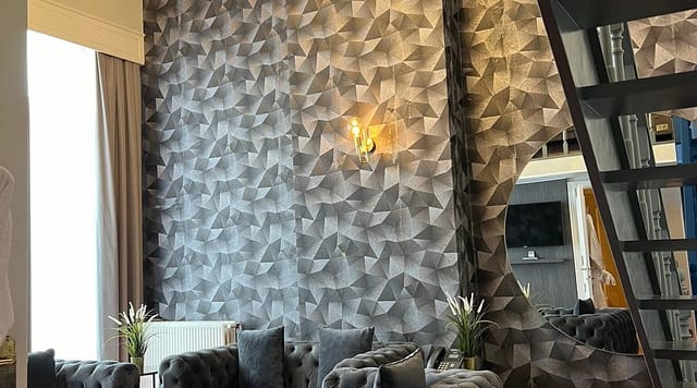 Premium executive breakout room with textured accent wall for VIP lounge or networking events.