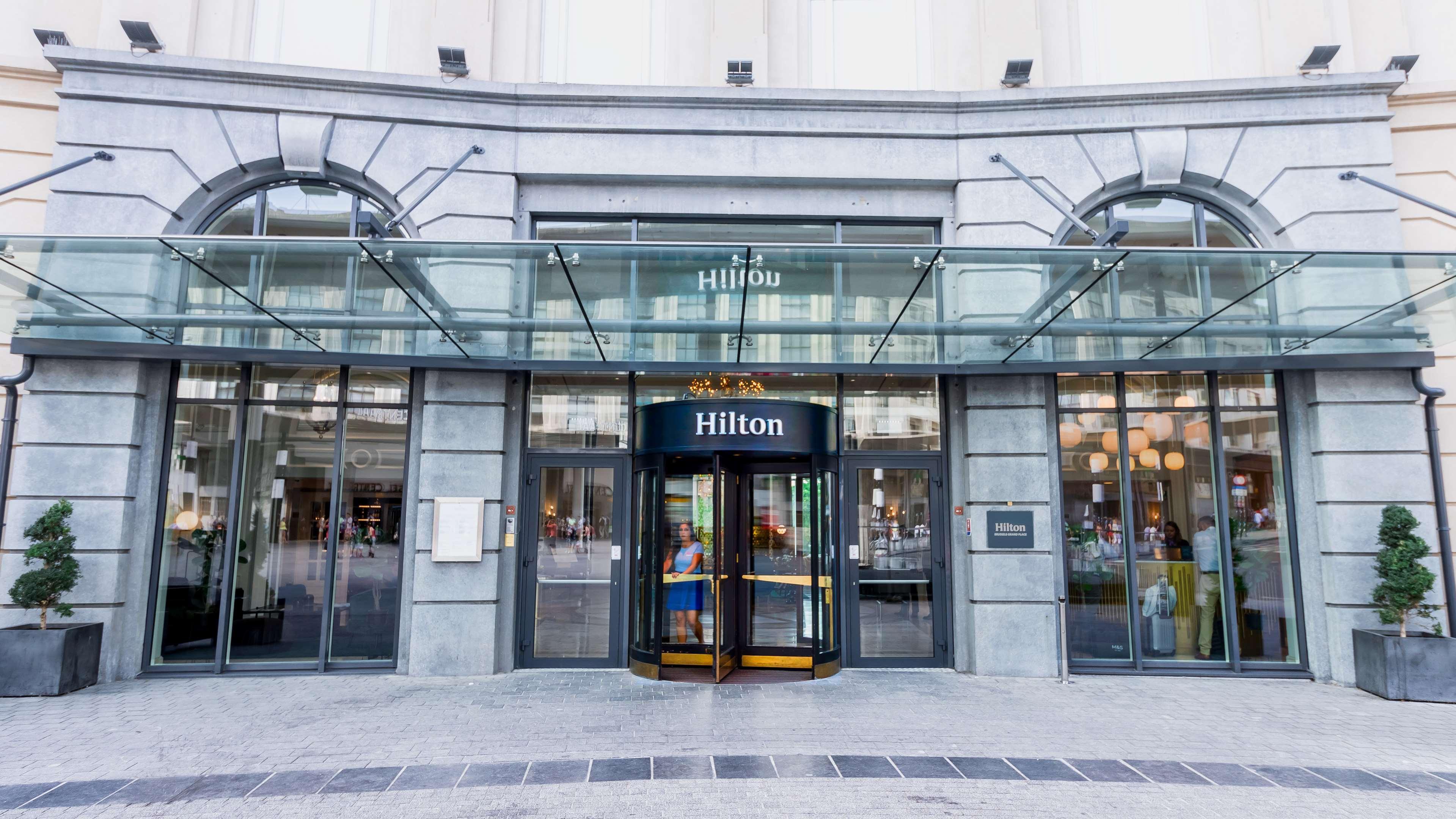 Hilton Brussels Grand Place entrance, modern design ideal for corporate events and conferences
