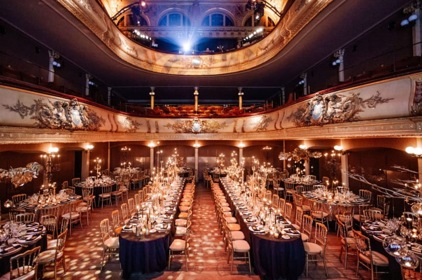 Salle des Clés theater banquet setup for elegant gala and corporate event dinner.