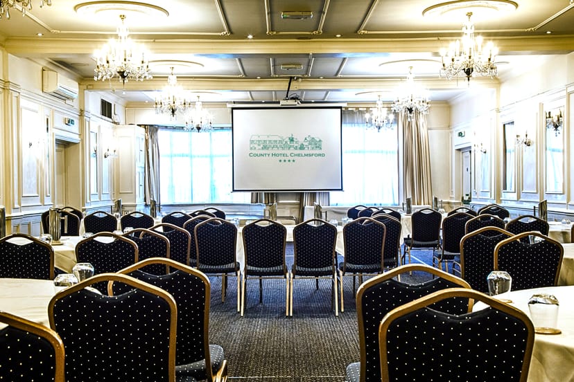 Crystal Ballroom conference setup with rows of seating for business seminars or corporate events.