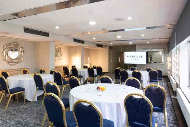 Lenham Suite banquet room set for corporate workshops and business events.