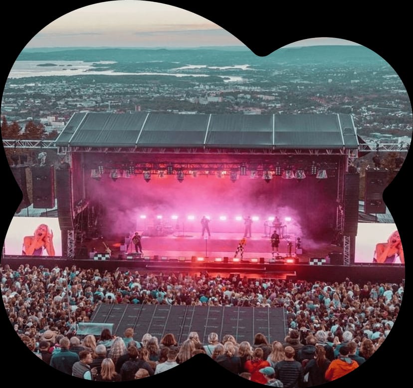 Outdoor concert stage with LED screens for OverOslo music festival production.