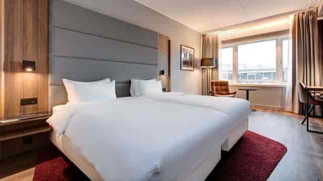 Modern twin-bedded meeting room at Radisson Blu Nydalen Hotel for corporate events and conferences.