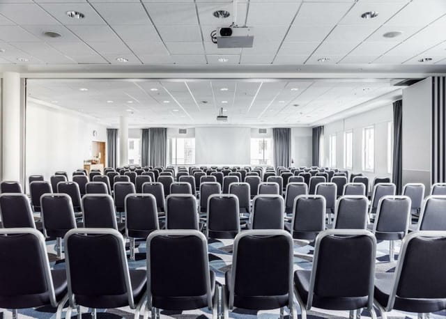 Theater-style conference room at Radisson Blu Nydalen Oslo for corporate seminars and presentations.