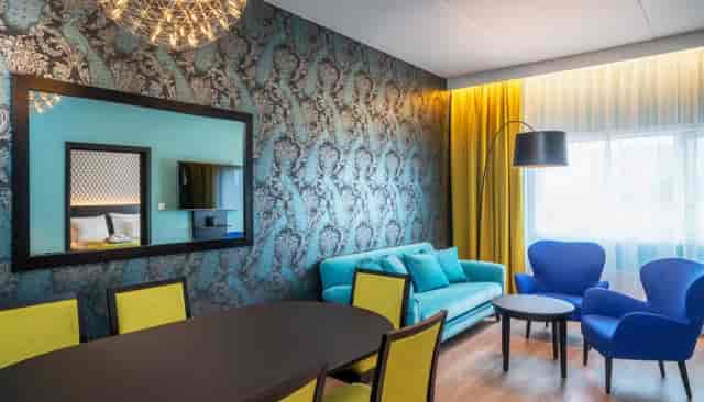 Thon Hotel Oslo Airport suite: modern breakout space for professional meetings and networking.