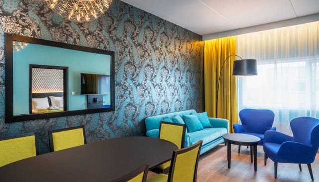 Thon Hotel Oslo Airport suite: modern breakout space for professional meetings and networking.