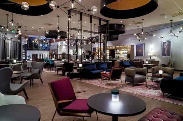 Multiarena breakout space at Radisson Oslo Airport for corporate networking and event planning.