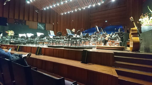 Oslo Philharmonic music room stage with orchestral risers for concert rehearsal and event rental.
