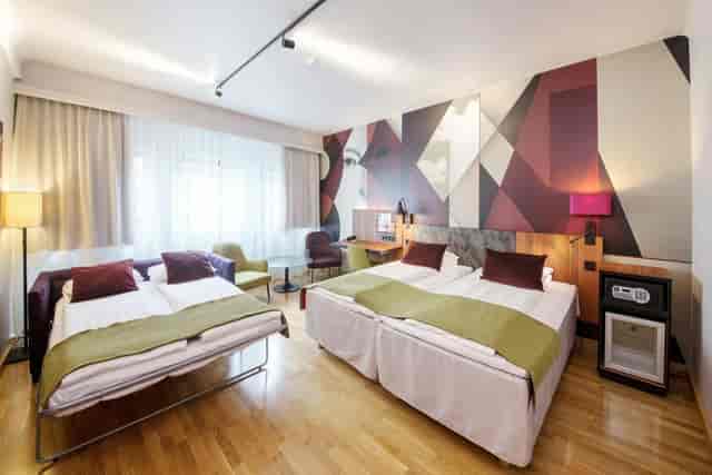 Triple-occupancy guest room at Scandic Solli for event housing and delegate accommodation.