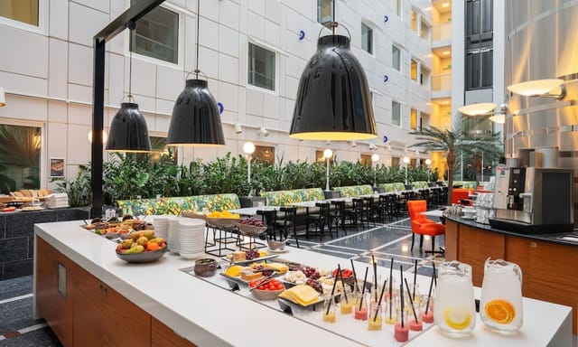 Thon Hotel Cecil atrium breakfast buffet for conference catering and corporate events.
