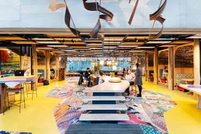Dynamic Silversquare corporate office breakout space for creative workshops and networking.