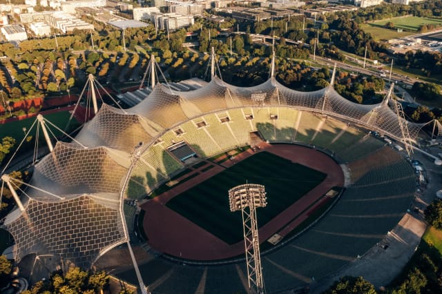Olympiahalle stadium interior for large-scale outdoor festivals and event staging.