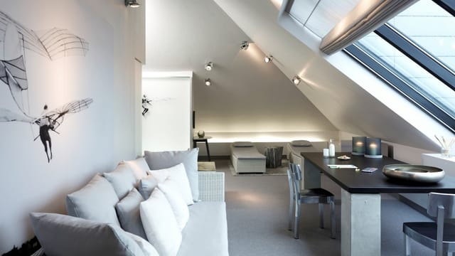 VIP Boardroom A with natural light for executive planning and strategy meetings.
