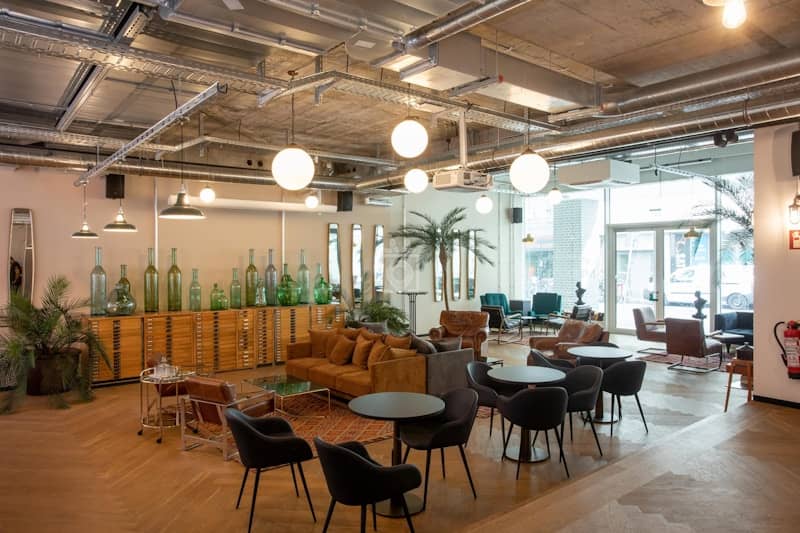 Corporate breakout space with lounge seating for networking and off-site meetings.