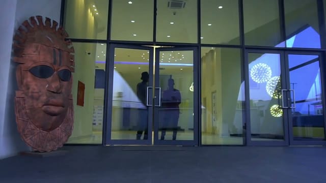 Ruby Foyer event entrance, modern architectural venue for corporate registration or gala arrivals.