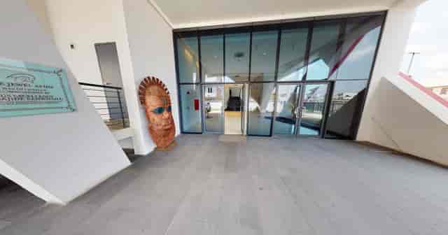 Modern event entrance at The Jewel Aeida, featuring spacious landing for corporate branding.