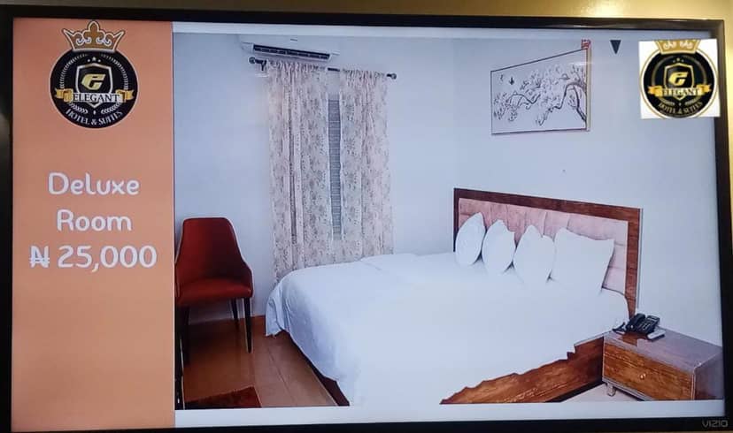 Super Deluxe budget room at Elegance Suites Hotel, ideal for affordable group travel and conferences.