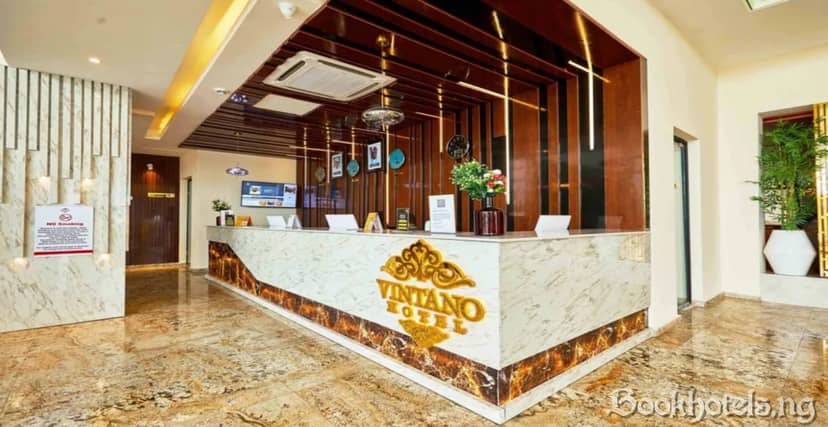 Sage Chinese Restaurant reception desk: modern hotel check-in for corporate events and conferences.