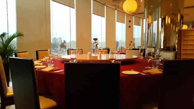 Sage Chinese Restaurant banquet table with red linens for corporate dining and private events.
