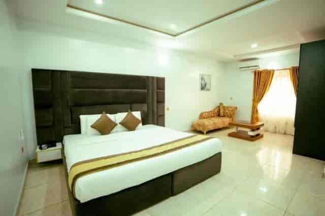 Upscale luxury hotel guest room for business travel and VIP conference stays.