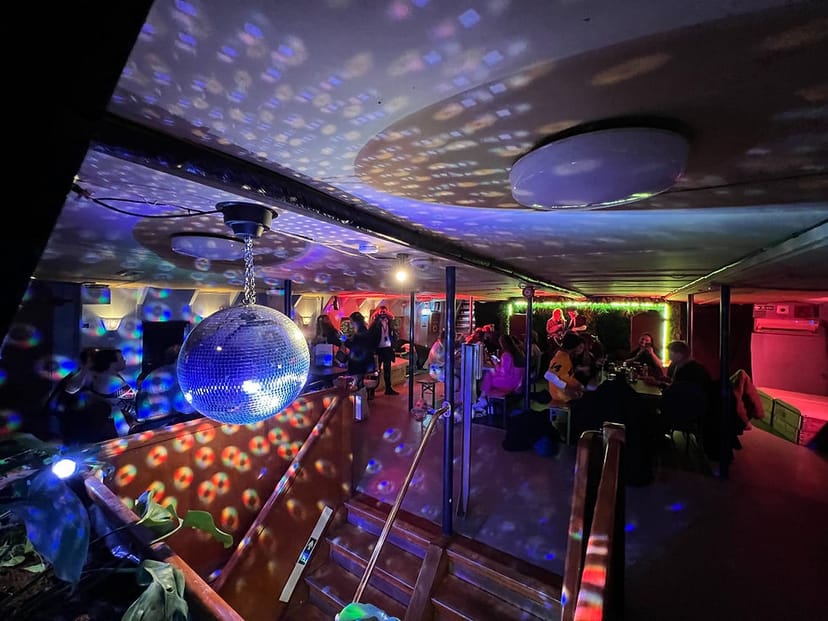 Upper Deck event space with disco ball lighting for private parties and social mixers.