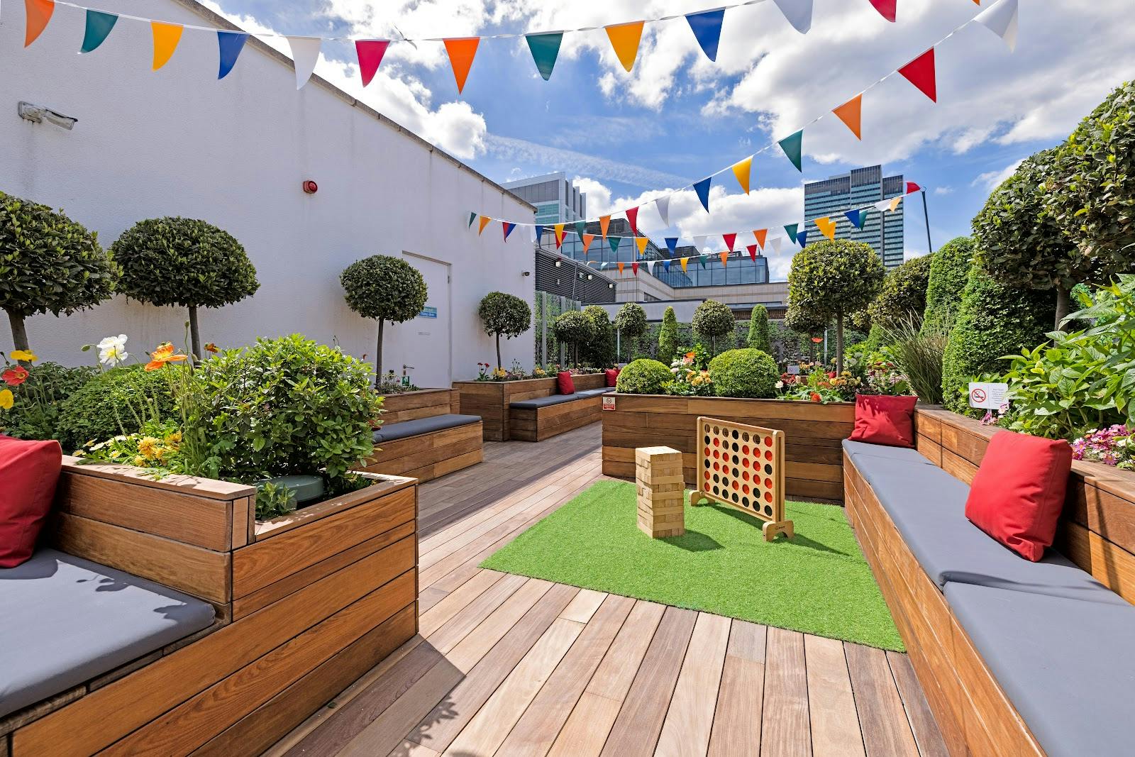 Vibrant rooftop event space at 30 Euston Square for gatherings and networking. - Banner