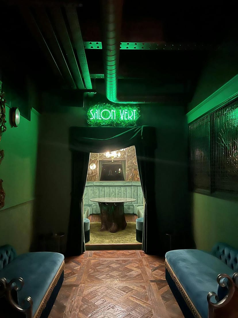 Salon Verte private dining room with bold mood lighting for VIP events and breakout sessions.