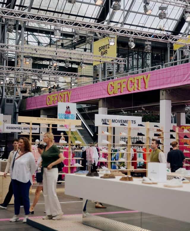 Retail pop-up showroom at CIFF trade show with modular shelving for fashion brand exhibition.