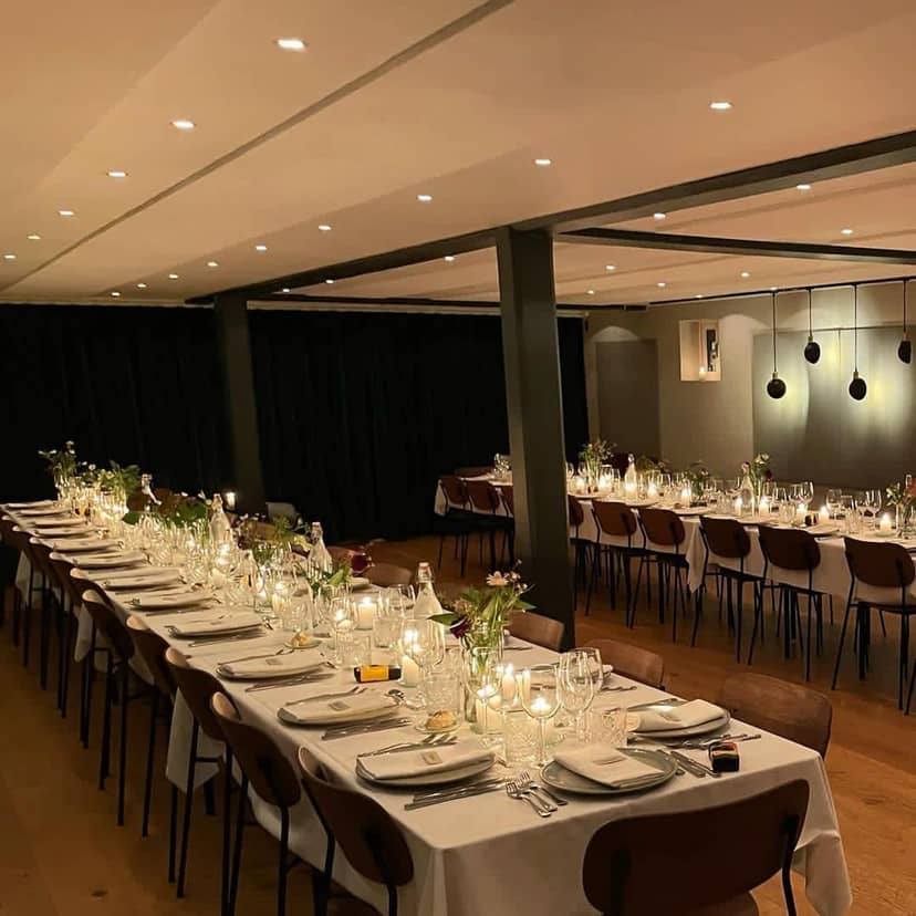 Private dining at TERRASSEN banquet hall with ambient lighting for elegant events.
