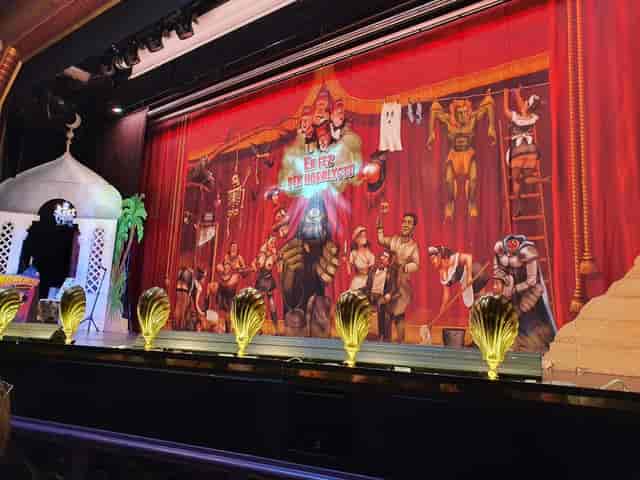 Glass Hall Theatre stage with gold accents for themed events and live performances.