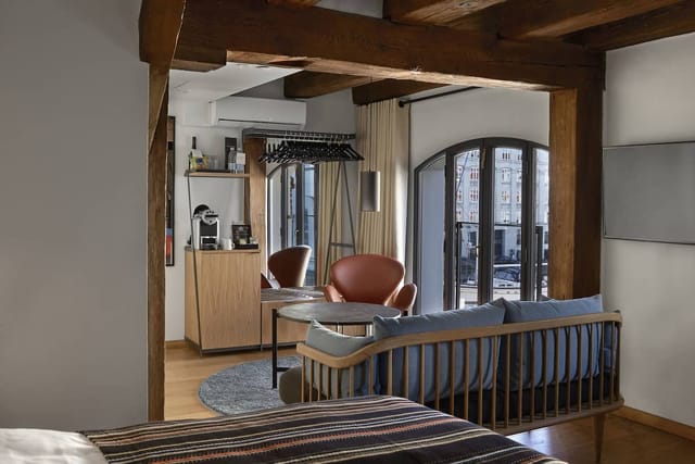Executive suite at 71 Nyhavn Hotel with meeting area for business travel and corporate events.