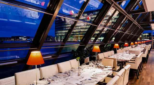 Harbour Hotel restaurant with floor-to-ceiling glass windows for gala or corporate dinner events.