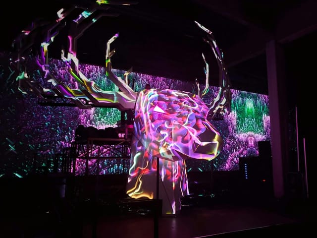 Projection mapping on sculptural centerpiece at TAP1 experiential event.