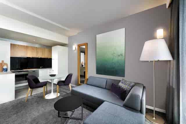 Adina Apartment Hotel Copenhagen suite, workspace area, executive travel, business accommodation.