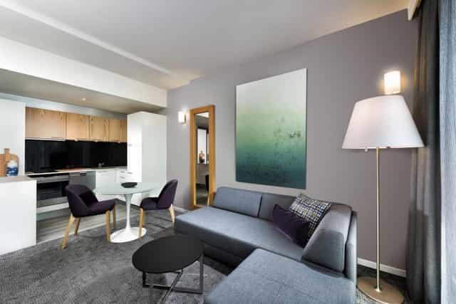 Adina Apartment Hotel Copenhagen suite, workspace area, executive travel, business accommodation.