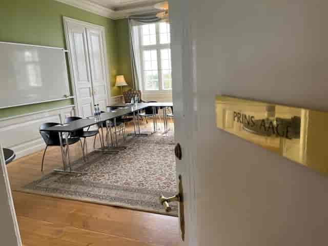 Boardroom-style breakout room at Bernstorff Slot for professional meetings and corporate events.