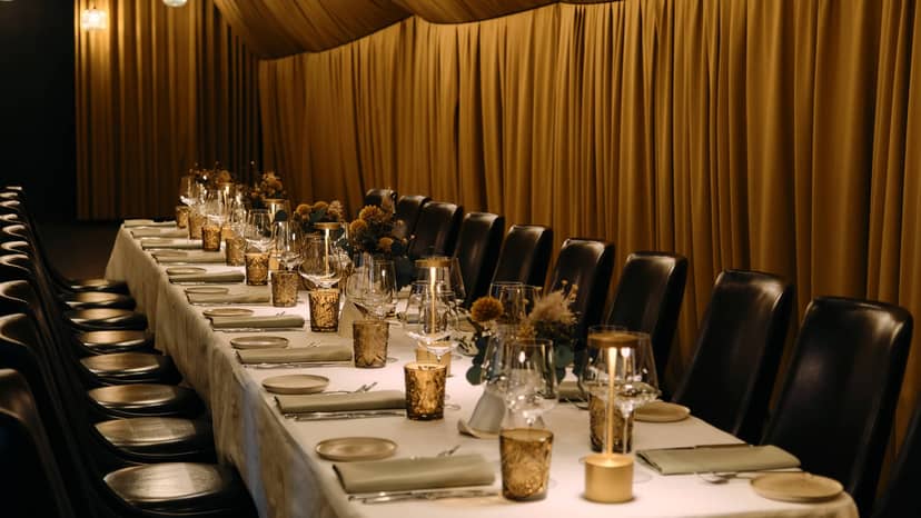Upscale banquet hall with elegant drapery for private dining and executive dinner events.
