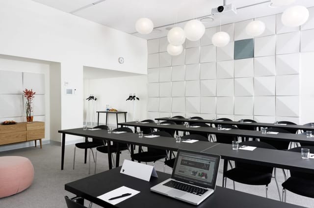 Classroom-style meeting room in AC Hotel Bella Sky, Copenhagen, perfect for corporate training events.