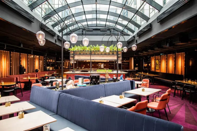 Scandic Falkoner glass atrium venue for upscale cocktail receptions and corporate mixers.