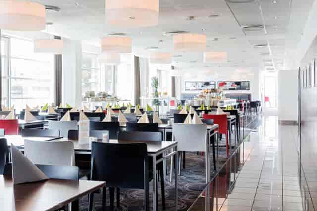 Scandic Sluseholmen restaurant dining space for business conferences and networking events.